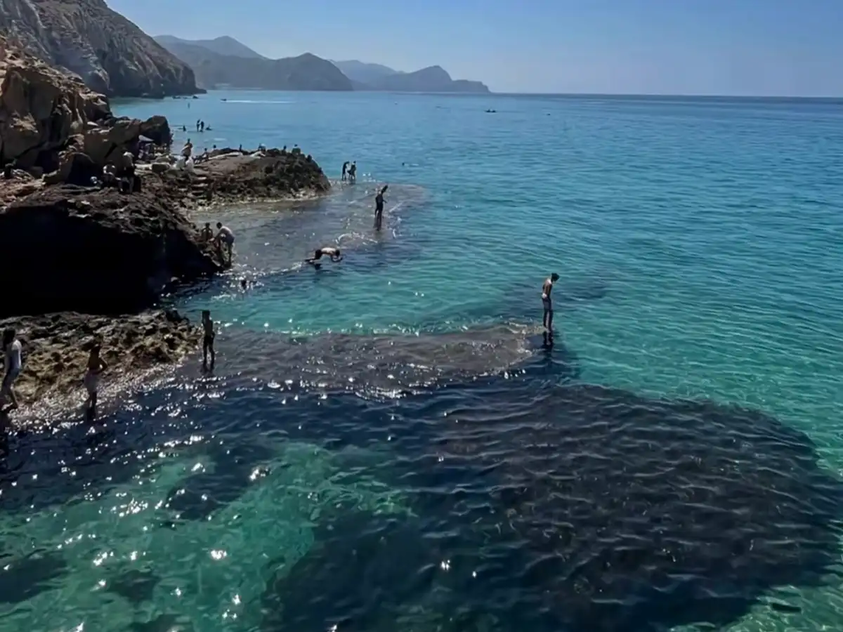 Al Hoceima blue beach Morocco with tourists
