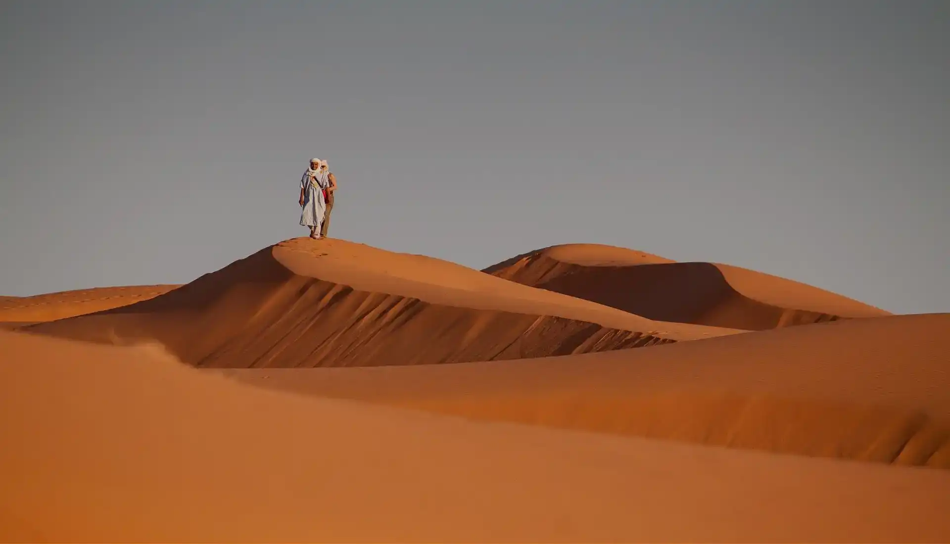 Visit Morocco and experience the golden dunes of the Sahara Desert