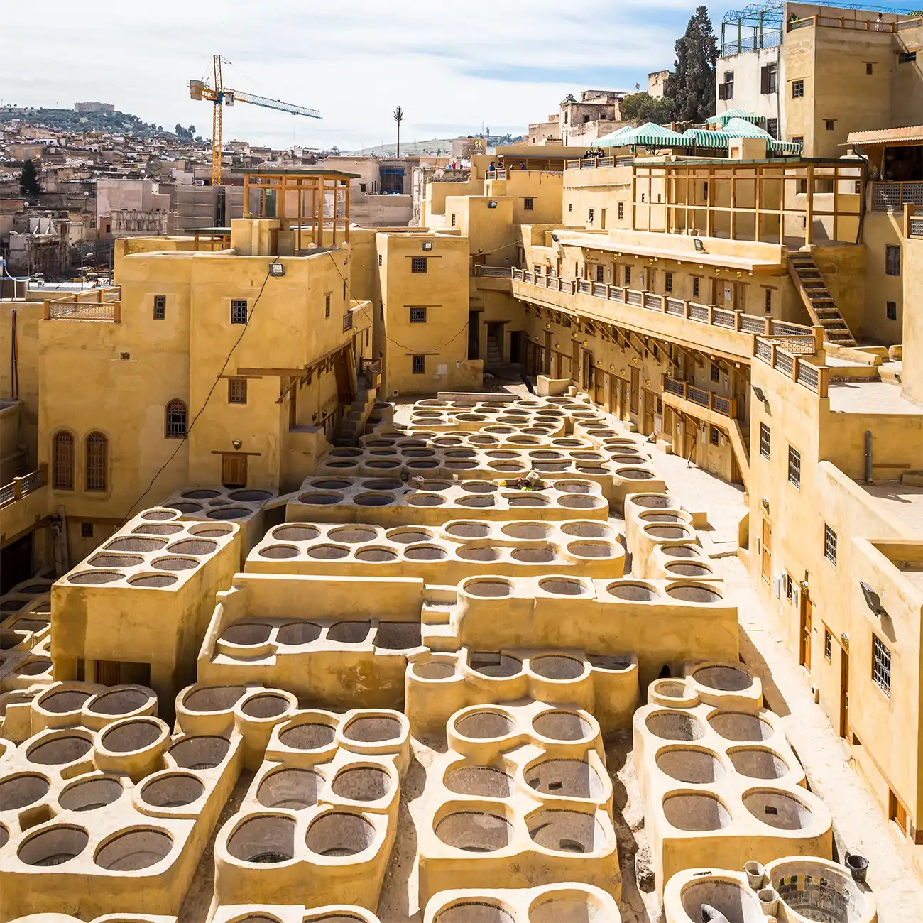 Chouara Tannery in Fes City with colorful dye basins.