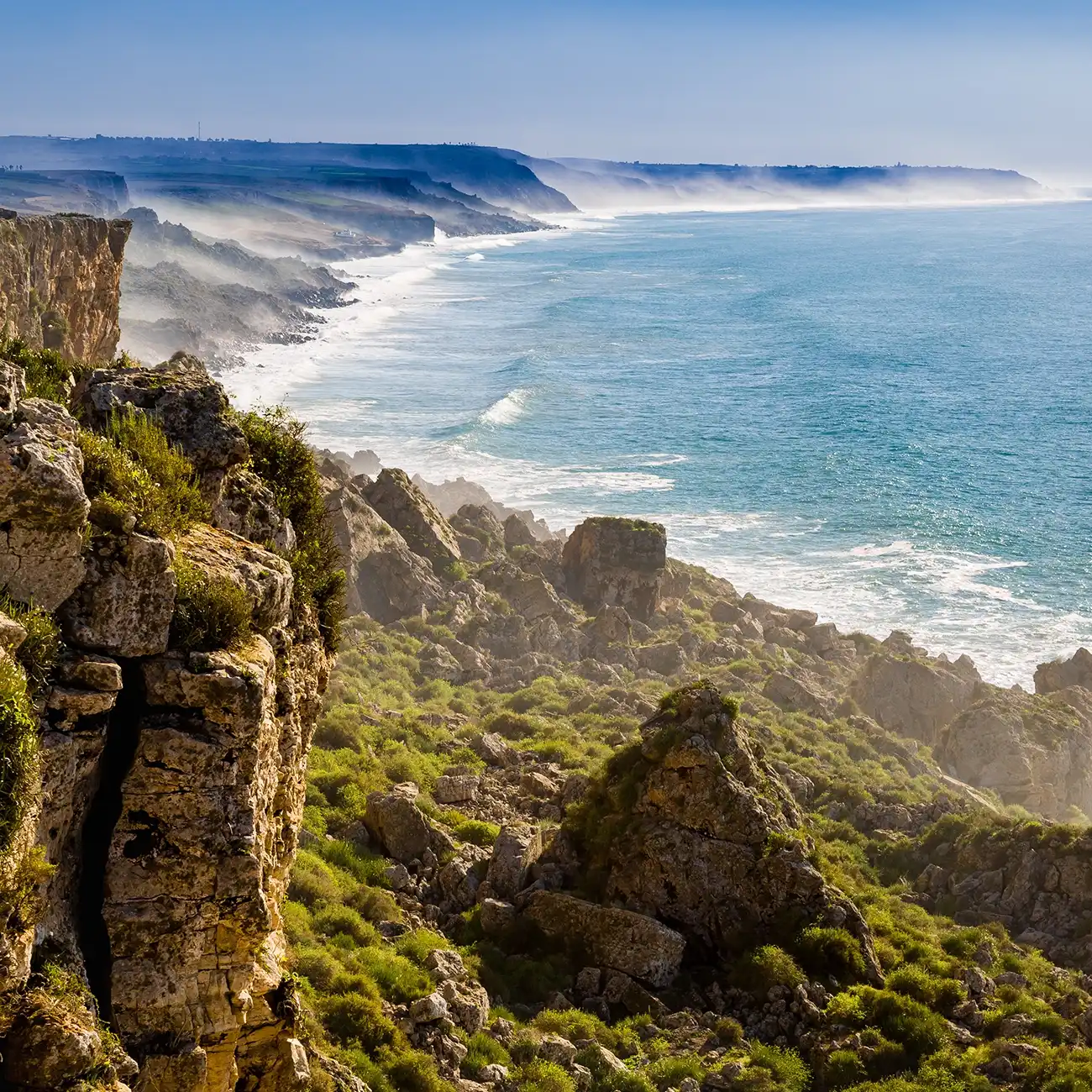 Safi beach with golden sand and waves along the Atlantic coast.