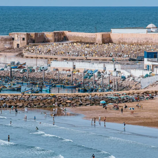 El Jadida City's beach with waves and golden sand