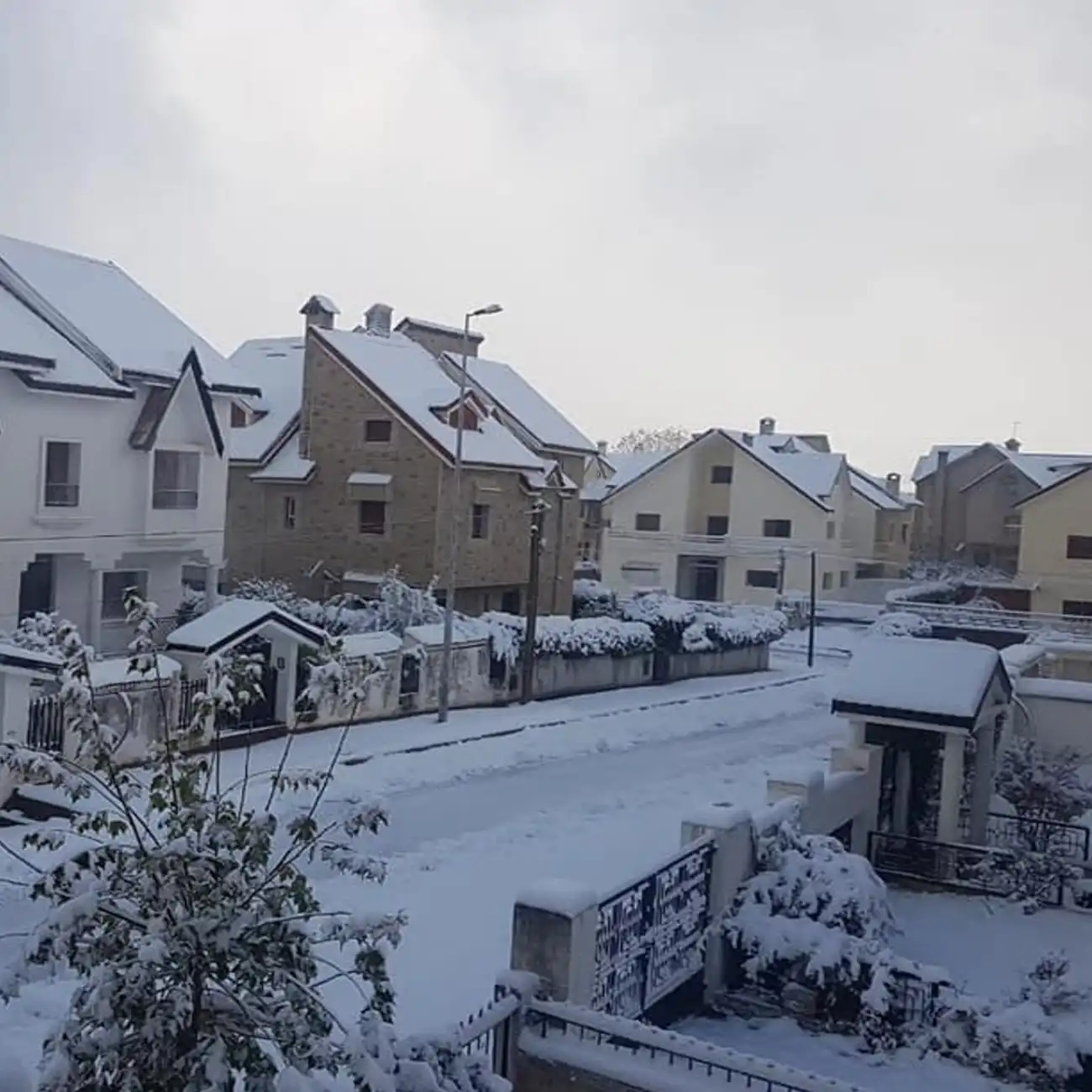 Ifrane City snow-covered streets with alpine-style houses in Morocco