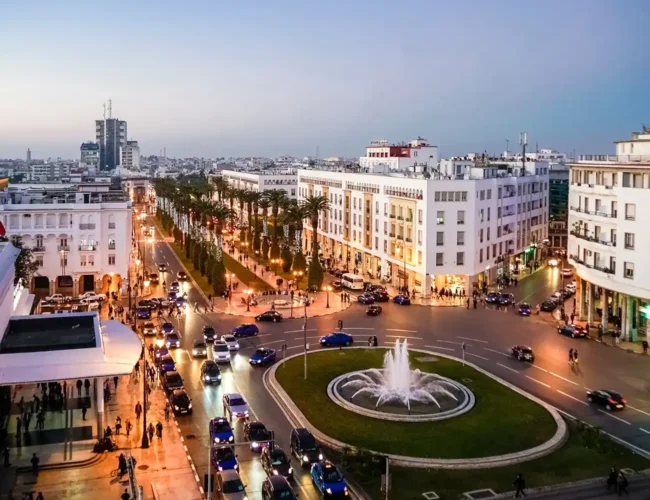 Night view of Rabat city center with illuminated buildings and streets